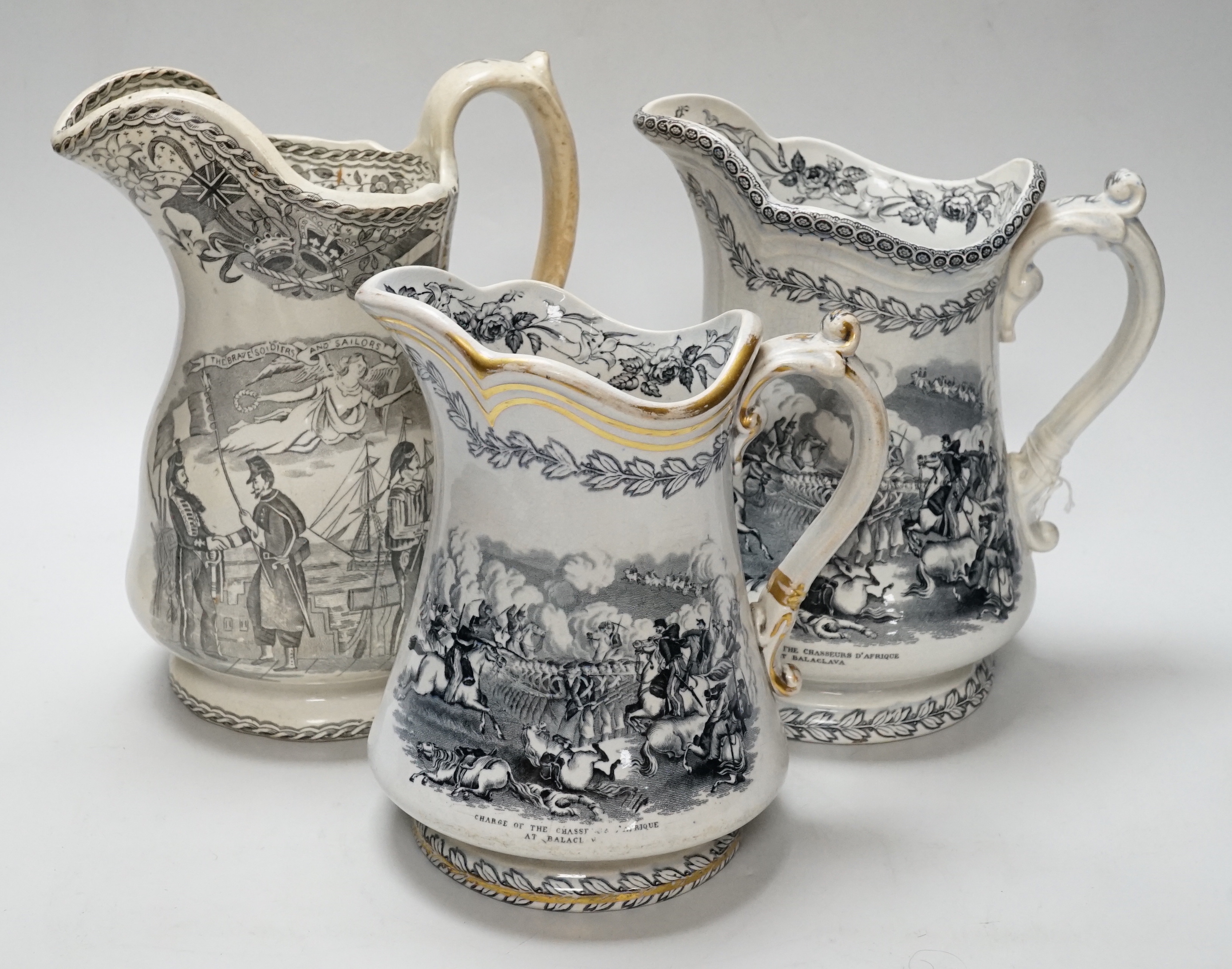 Three Crimean war commemorative stone china jugs, c.1856, tallest 22cm (3)